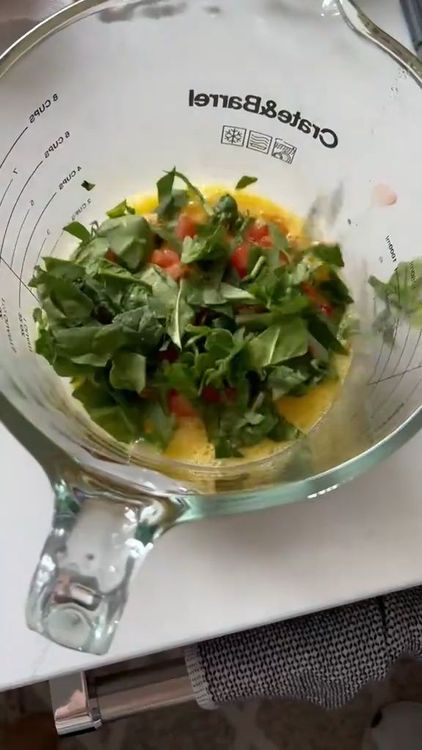 Step 1.1: Mix the tomato flesh with eggs, baby spinach, feta cheese, and spices