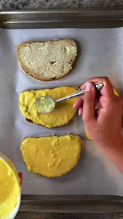 Step 1.1: Scoop the egg and cheese mixture onto the buttered bread