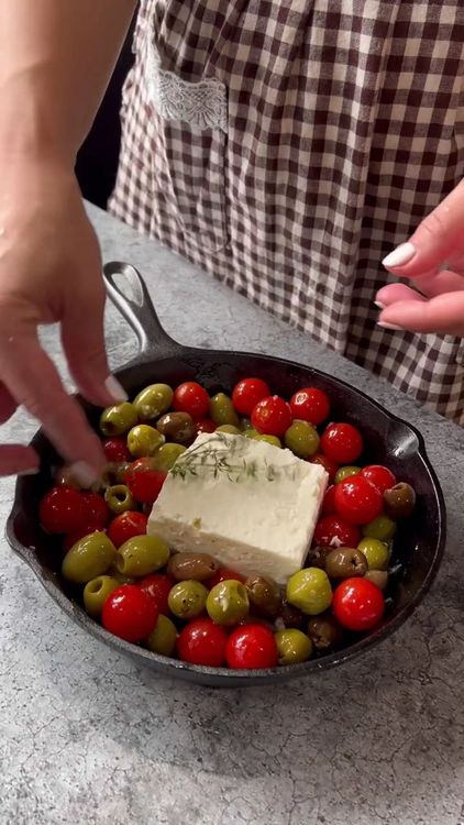 Step 2.1: Place the feta cheese on top of the mixture