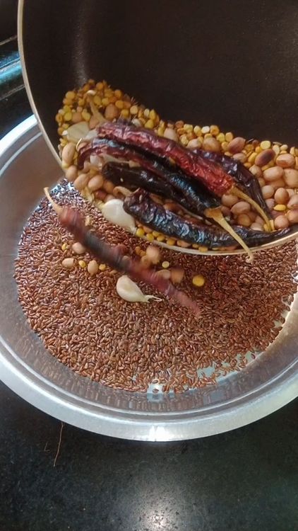 Step 1.3: Next dry roast for 3 min red chilli, chana dal , peanuts , garlic pods , urad dal , cumin seeds and black pepper corns