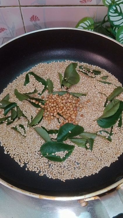 Step 1.1: In the same pan , dry roast sesame seeds, coriander seeds, few curry leaves