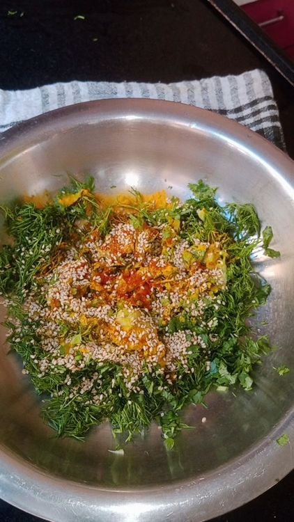 Step 1.1: Add the spices mentioned above with bajra - wheat - rice flour 