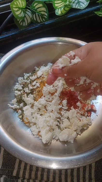 Step 1.1: Add crushed paneer and gradually add water and knead to form a soft, pliable dough