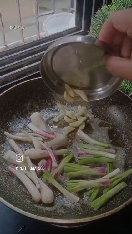 Step 1.1: In a pan , heat butter and once the butter melts , toss cumin seeds, spring onion and garlic pods