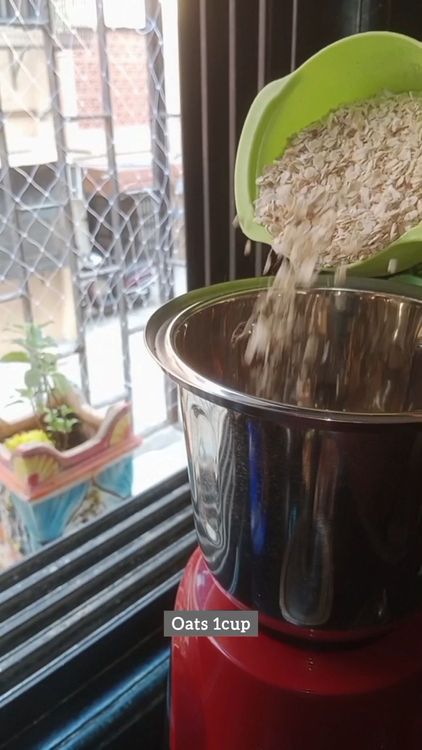 Step 1.1: In a mixie jar, add oats , gram flour, washed few Spinach leaves, salt and turmeric