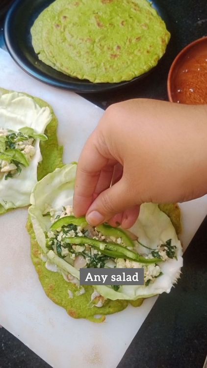 Step 3.3: Take palak wrap , apply soaked cashew paneer paste, place cabbage leaf, add the palak paneer stuffing, any salad pickle like salted onion or capsicum