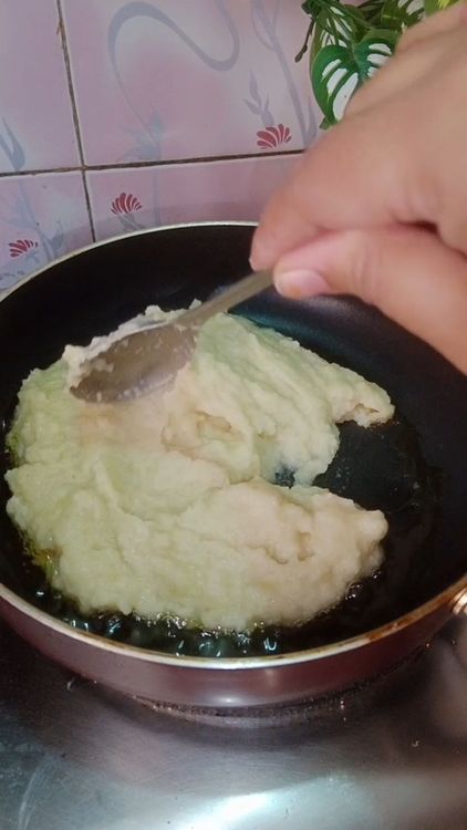 Step 1.2: Heat ghee in a deep bottom pan , add the steamed amla paste , cook till the mixture loses it's moisture