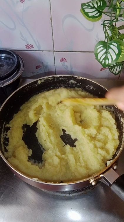 Step 1.4: Heat ghee in a deep bottom pan , add the steamed amla paste , cook till the mixture loses it's moisture