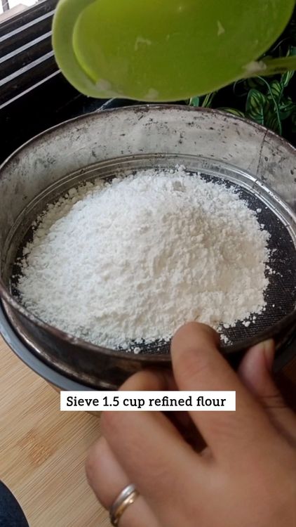 Step 1.1: Sieve refined flour and powdered sugar, add milk gradually to form a smooth, non-sticky dough