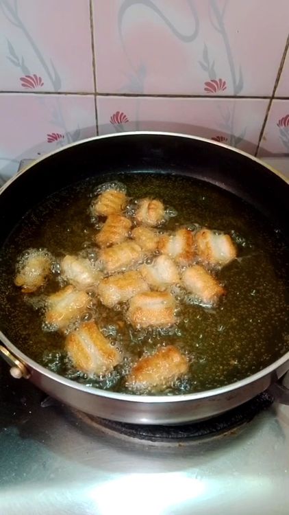 Step 1.1: Heat oil in a deep pan over medium heat
