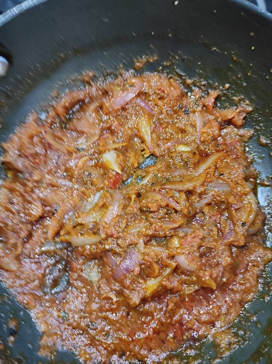 Step 1.1:  Add ginger garlic paste and tomato puree, keep stirring