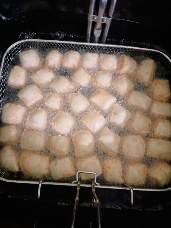 Step 1.1: Deep fry them turning every 1 minute to achieve an even golden brown on both sides