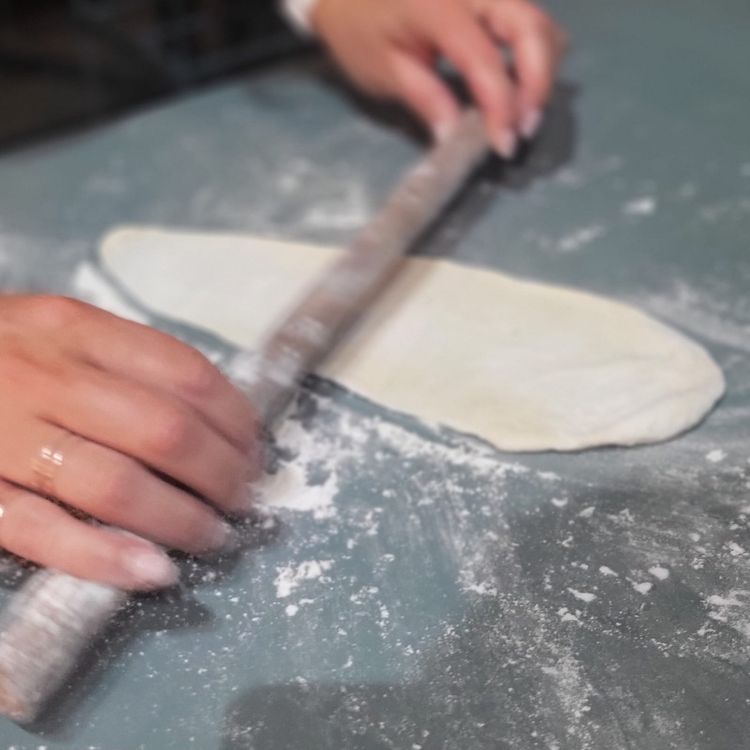 Step 2.1: Roll each flatbread into an oval shape without giving them time to rise