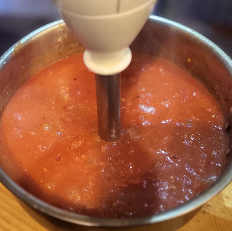Step 1.1: Add the sliced chillies, garlic, and cumin