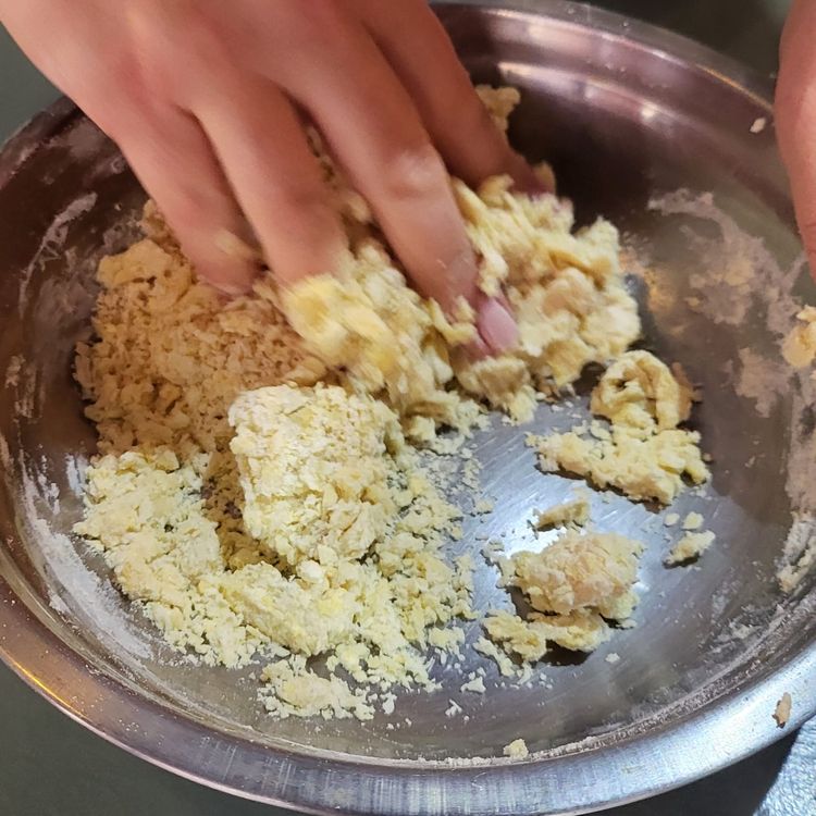 Step 1.1: Place the flour in a mixing bowl and make a hole in the middle