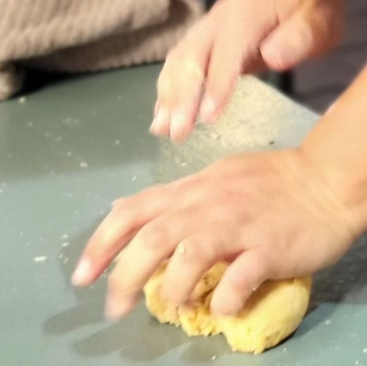 Step 1.1: Add water bit by bit while kneading the dough with the palm of your hand