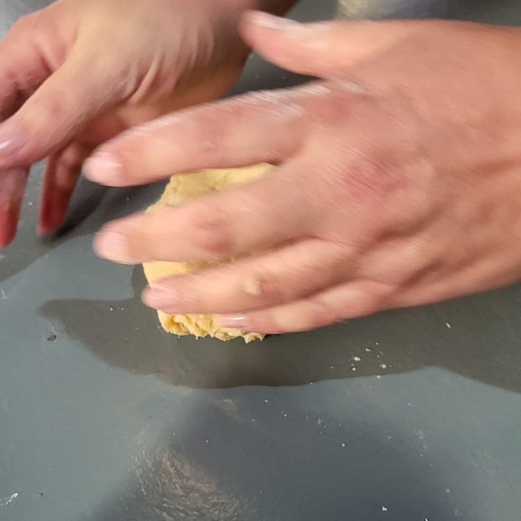 Step 1.2: Add water bit by bit while kneading the dough with the palm of your hand