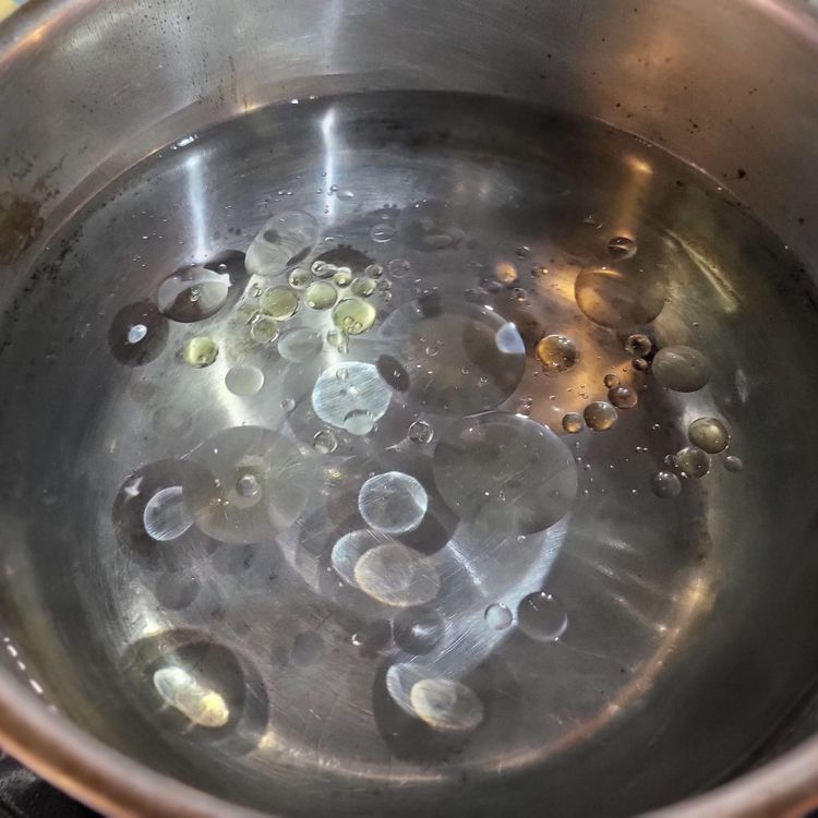 Step 3.1: Bring a pot of water to boil and add a tiny bit of vegetable oil