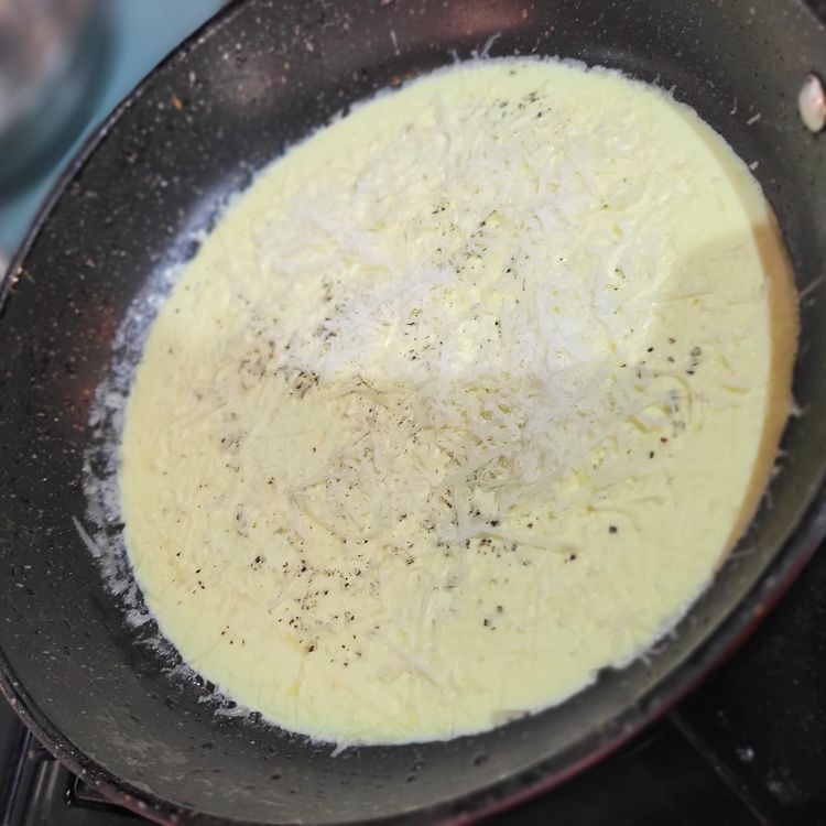 Step 4.1: Heat a saucepan, add the cream and parmesan cheese, and stir until well combined