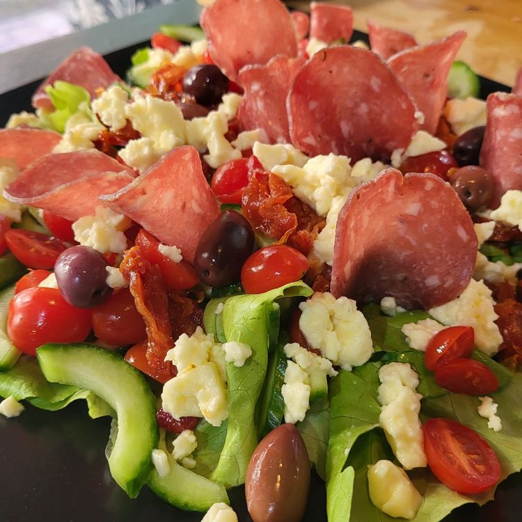 Step 1.1: Fold the Italian salami into half moons & place them into the salad in random places