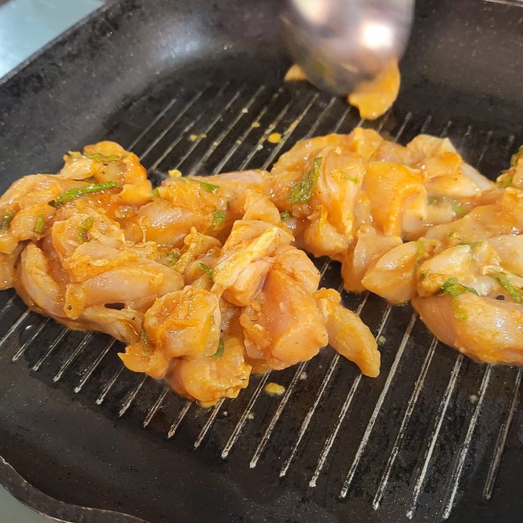 Step 1.1: Heat a pan, add the rest of the olive oil blend, then brown the marinated chicken strips