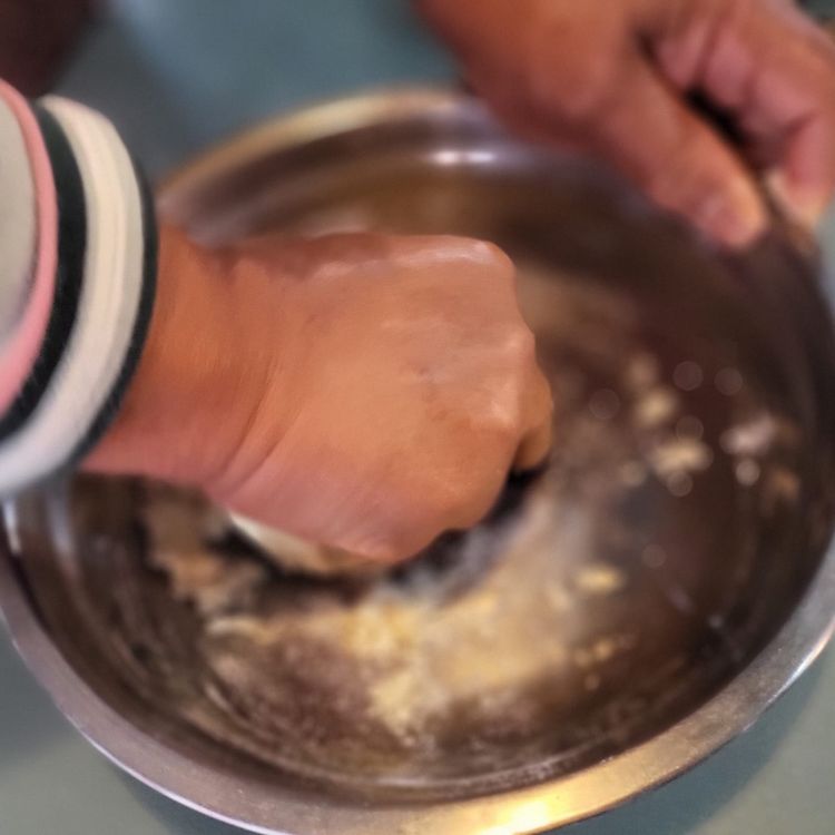 Step 1.1: Place the dough onto a lightly floured surface, then knead with the palms of your hands