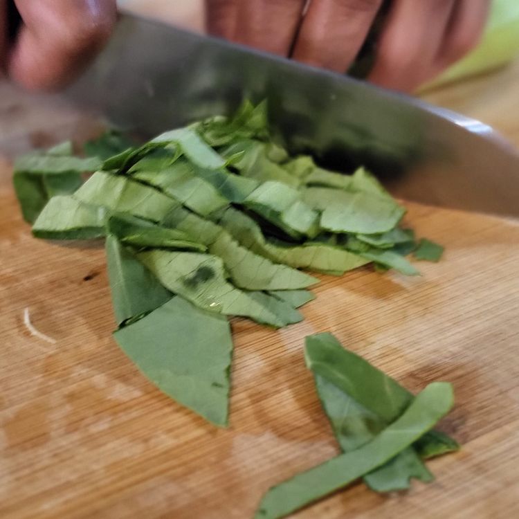 Step 1.2: In the meantime, place your salad ingredients into a mixing bowl: pak choi, tomatoes, spring onions, carrots, and radish