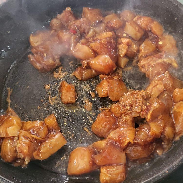 Step 1.1: Heat a wok and add some vegetable oil
