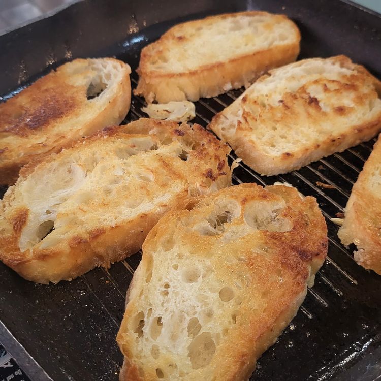Step 1.1: When the bread slices are toasted to golden brown at the bottom, flip them over to toast the other side