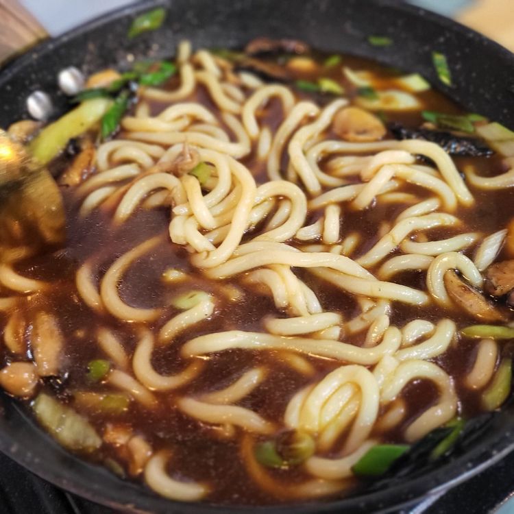 Step 2.1: Pour the miso broth over the noodles and turn down the heat to simmer