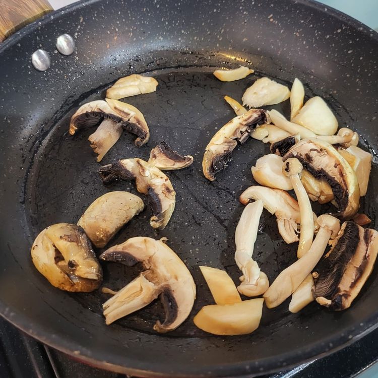 Step 2.1: Heat a pan to smoking hot, add the sesame oil, then add the mushrooms and flash fry them