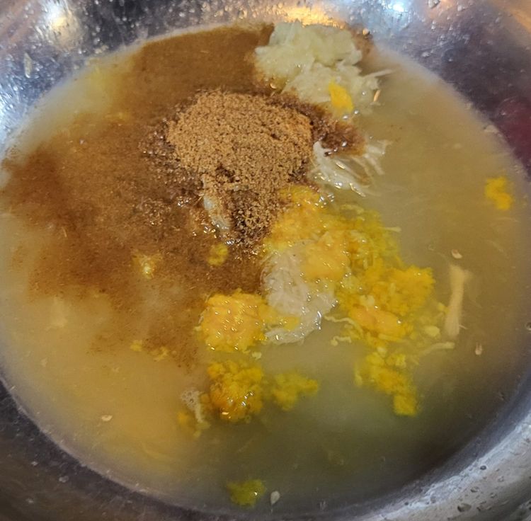 Step 1.1: In a large bowl, whisk together the garlic, oregano, cumin, salt, pepper, orange zest, orange juice, lime juice, lemon juice, and olive oil blend until well combined