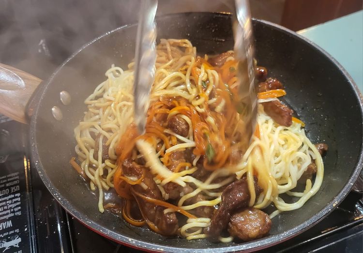 Step 1.1: Heat a wok until smoking hot, add the sesame oil, then add the carrots and stir fry for 1 minute