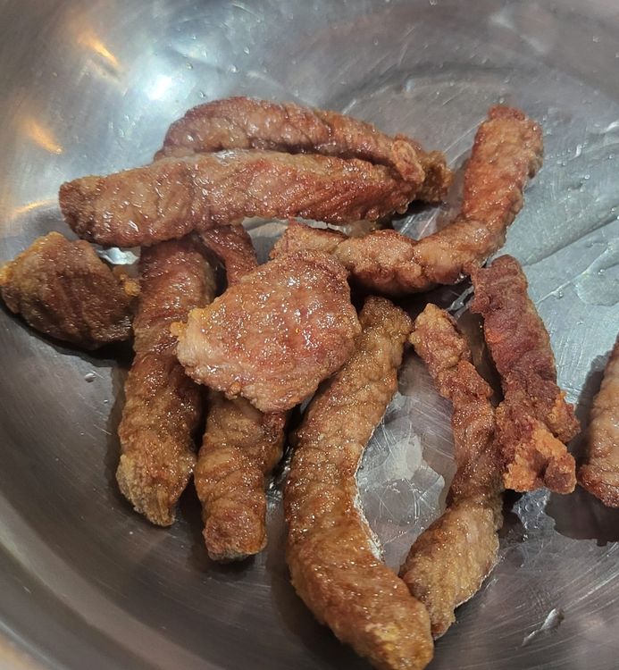 Step 1.1: Season the beef strips with a little salt and pepper