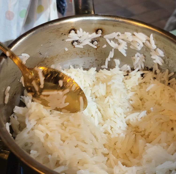 Step 1.1: Return the rice to the pot and heat through before serving