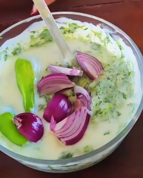 Step 4.1: In a food processor, combine chopped coriander, Greek yogurt, red onion, green chillies, and lemon juice