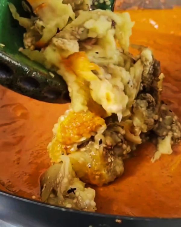 Step 3.1: Add the shredded roasted aubergine to the sauce