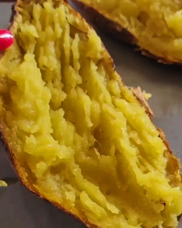 Step 3.1: Place the baked sweet potatoes on a plate and fluff the insides with a fork