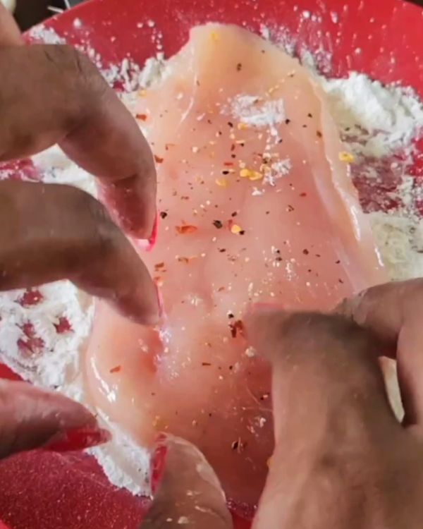 Step 1.1: Lightly coat the chicken slices with cornstarch, then shake off any excess