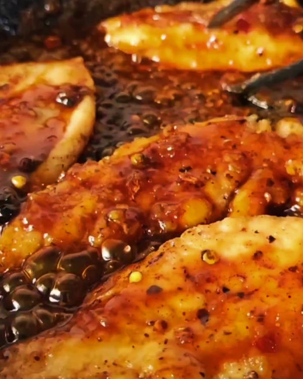 Step 3.1: Return the seared chicken breasts to the skillet, spooning the glaze over them