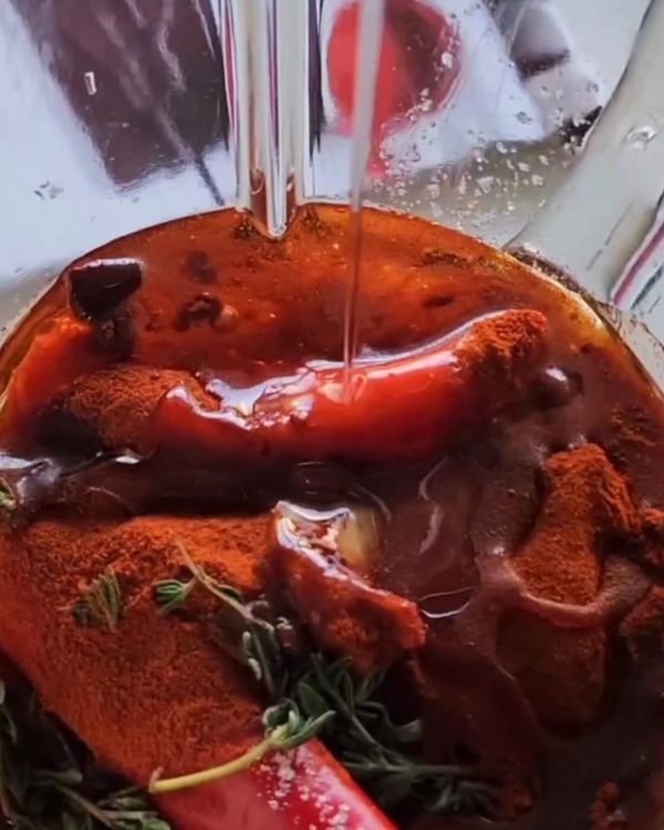 Step 1.1: Add the capsicums, garlic, red chilies (if using), lemon juice, paprika, thyme, vegetable oil, and salt to a blender