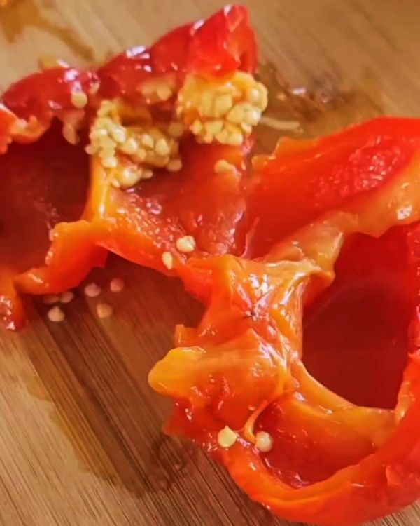 Step 1.1: Let the capsicums cool, peel off the charred skin, and remove the seeds