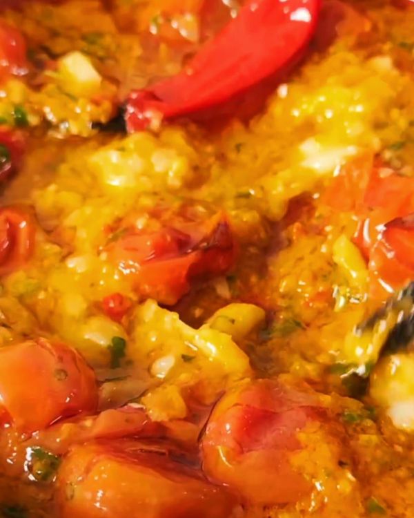Step 1.1: In a pan over medium heat, add the roasted tomatoes, garlic, and chilies along with the tomato puree