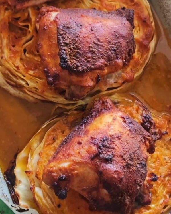 Step 5.1: Serve the roasted cabbage steaks with the chicken thighs on top