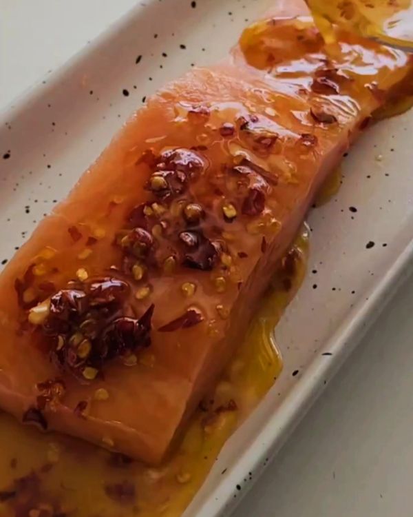 Step 1.1: Place the salmon in a shallow dish, pour the marinade over it, and gently rub it into the fish