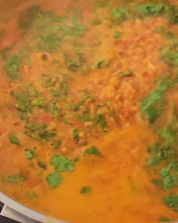 Step 3.1: Once cooked, turn off the heat, add the chopped coriander, and stir