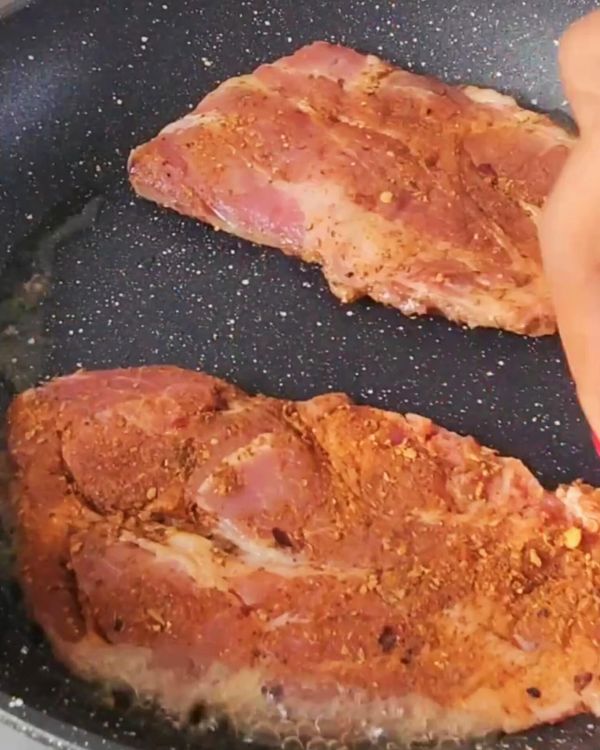 Step 1.1: Pat dry the pork chops and season with salt and pepper