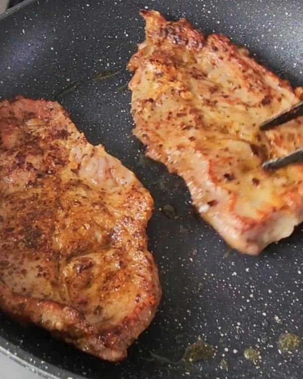 Step 1.1: Heat oil in a pan over medium-high heat, then sear the chops for 2-3 minutes per side until browned