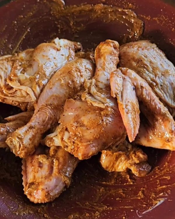 Step 1.1: Add the chicken pieces to the marinade, coating them well