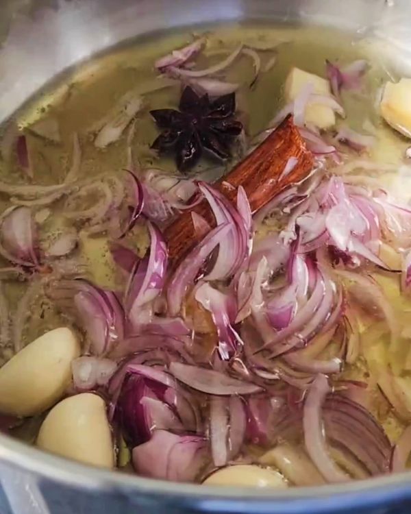 Step 2.1: Cook gently for 10-15 minutes, stirring occasionally, until the aromatics are golden brown and fragrant